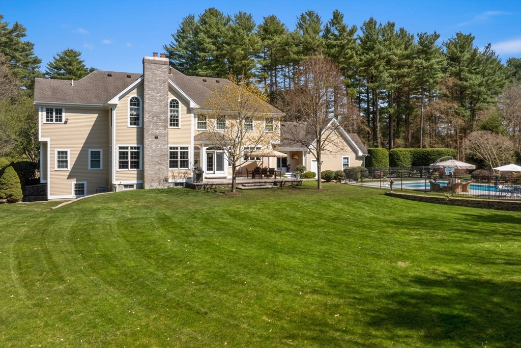 59 Anderson Farm Road Hanover, MA 02339 - Photo 33 of 38 a view of a house with a big yard