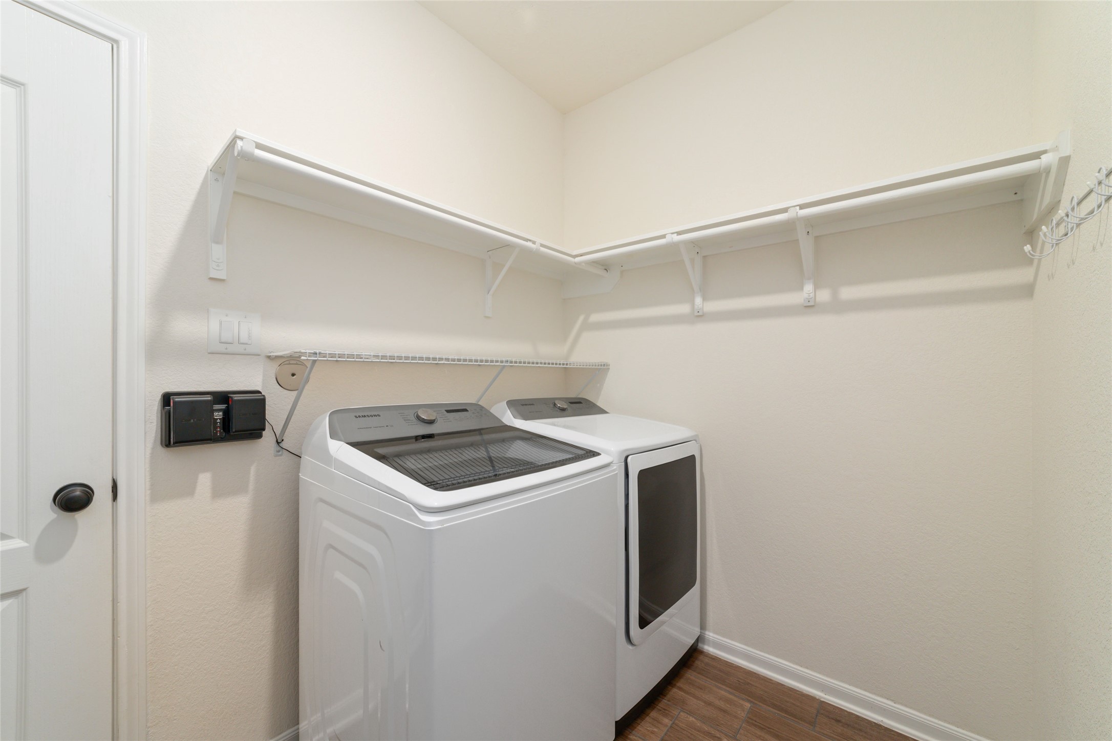 25414 Whitehaven Gate Street Katy, TX 77493 - Photo 17 of 32 a utility room with dryer and washer