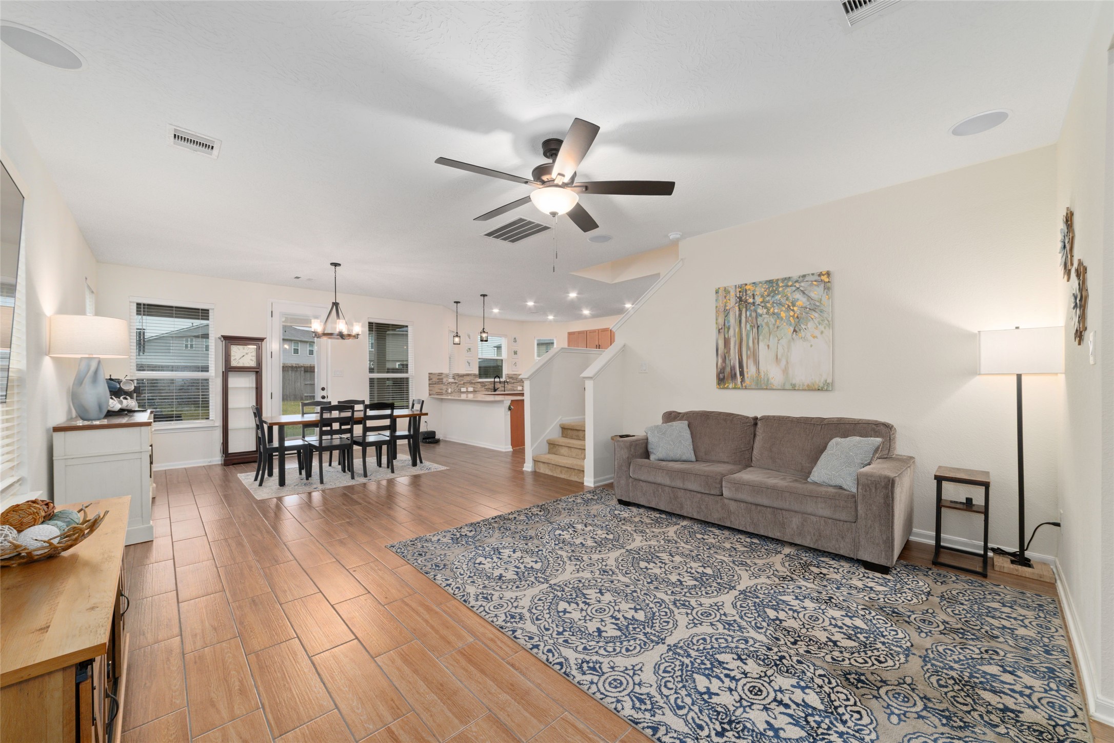 25414 Whitehaven Gate Street Katy, TX 77493 - Photo 5 of 32 a living room with furniture and wooden floor