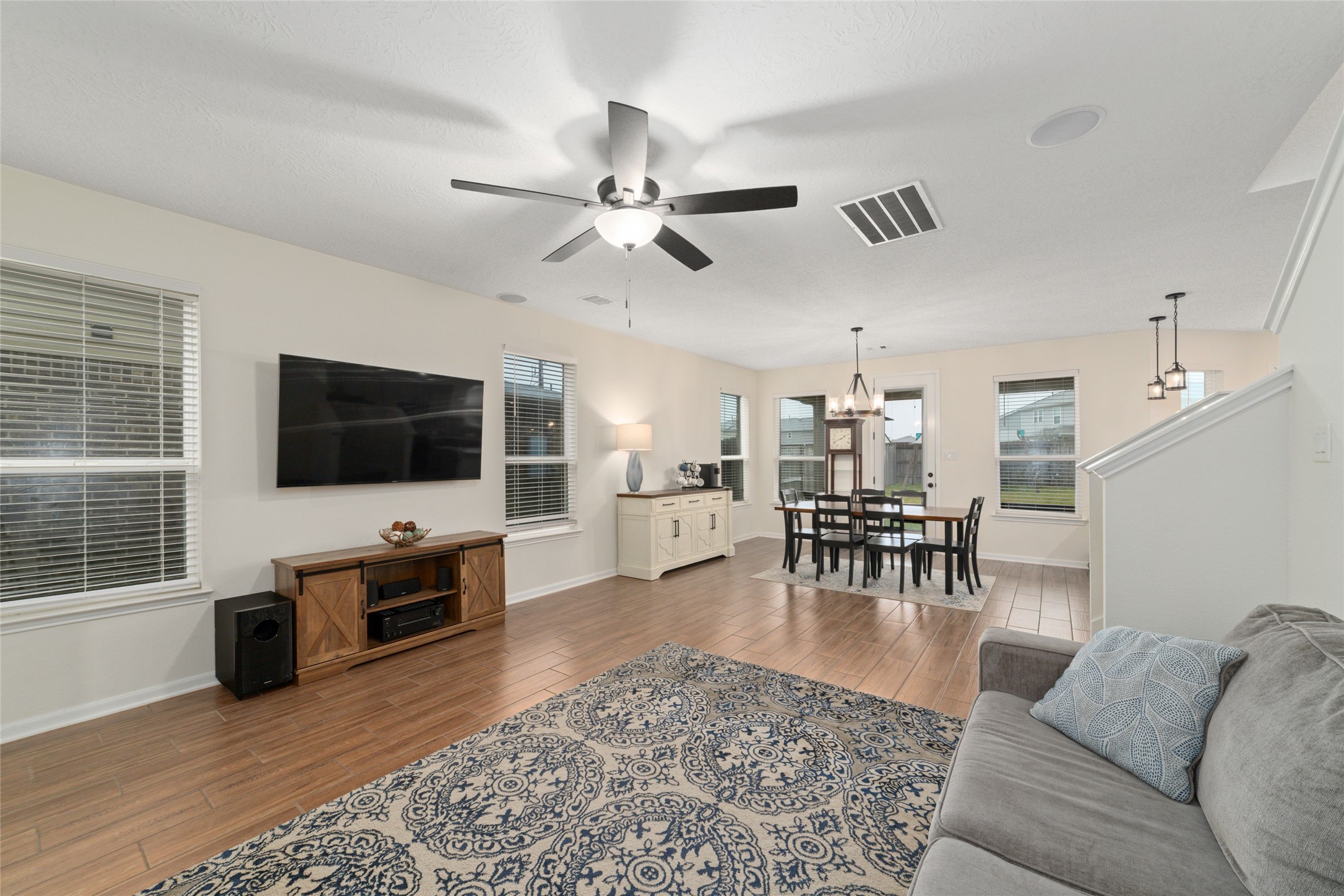 25414 Whitehaven Gate Street Katy, TX 77493 - Photo 7 of 32 a living room with furniture and a flat screen tv