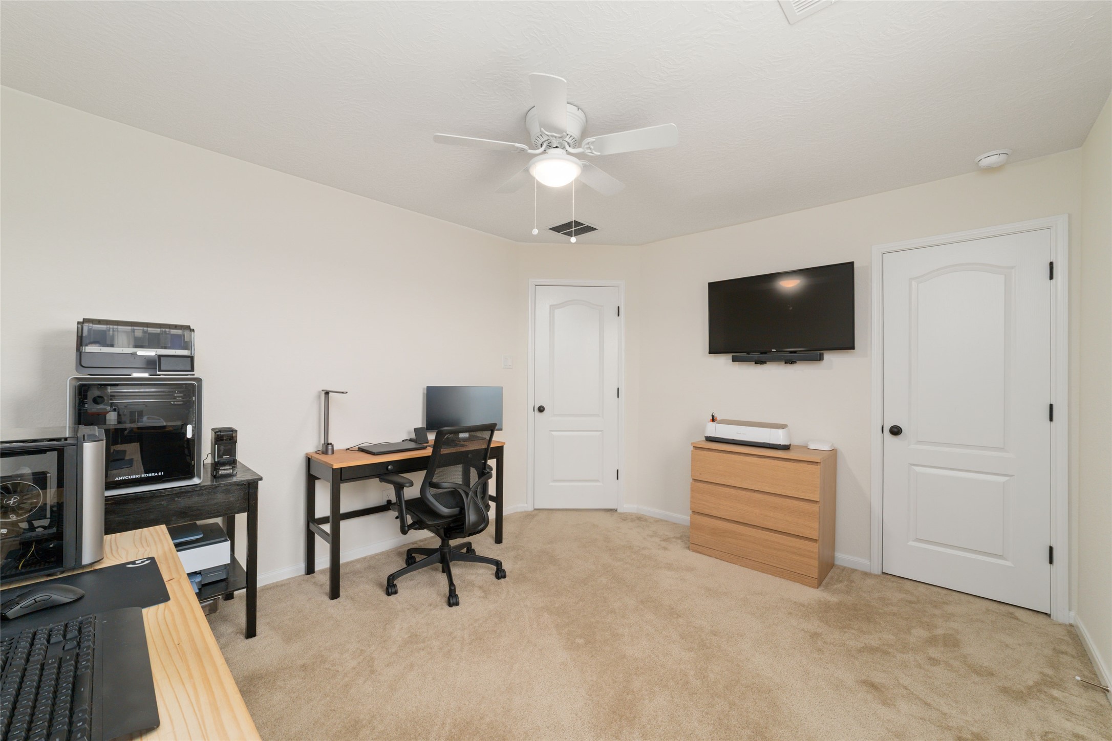 25414 Whitehaven Gate Street Katy, TX 77493 - Photo 8 of 32 a view of a livingroom with furniture and a flat screen tv