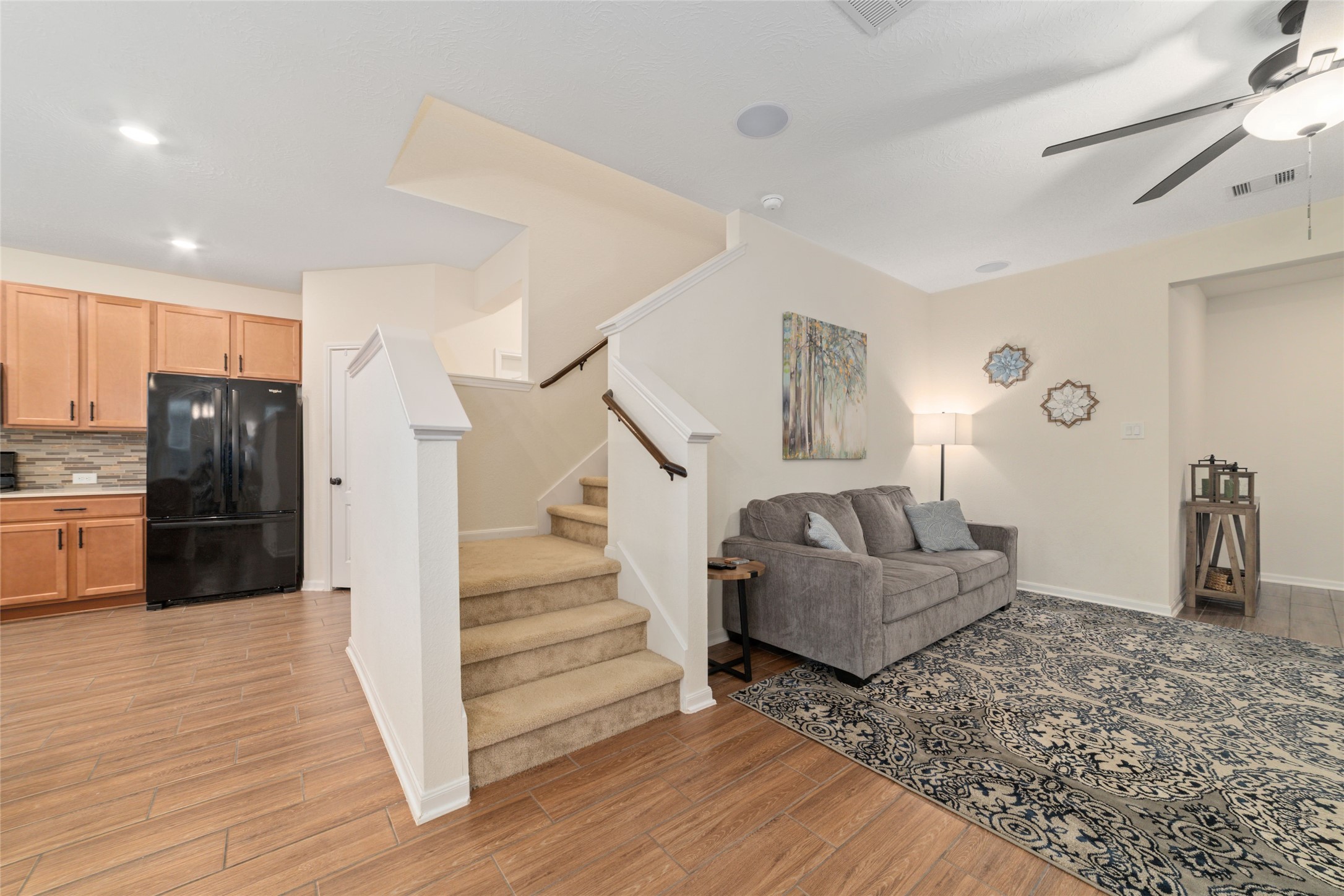 25414 Whitehaven Gate Street Katy, TX 77493 - Photo 9 of 32 a living room with furniture and a wooden floor
