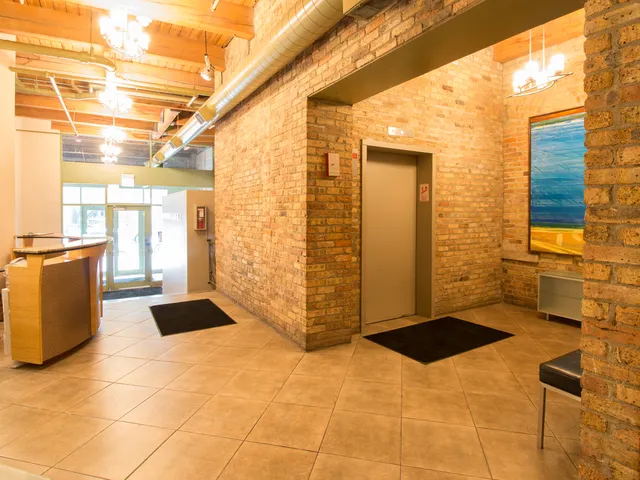 a view of a patio with table and chairs