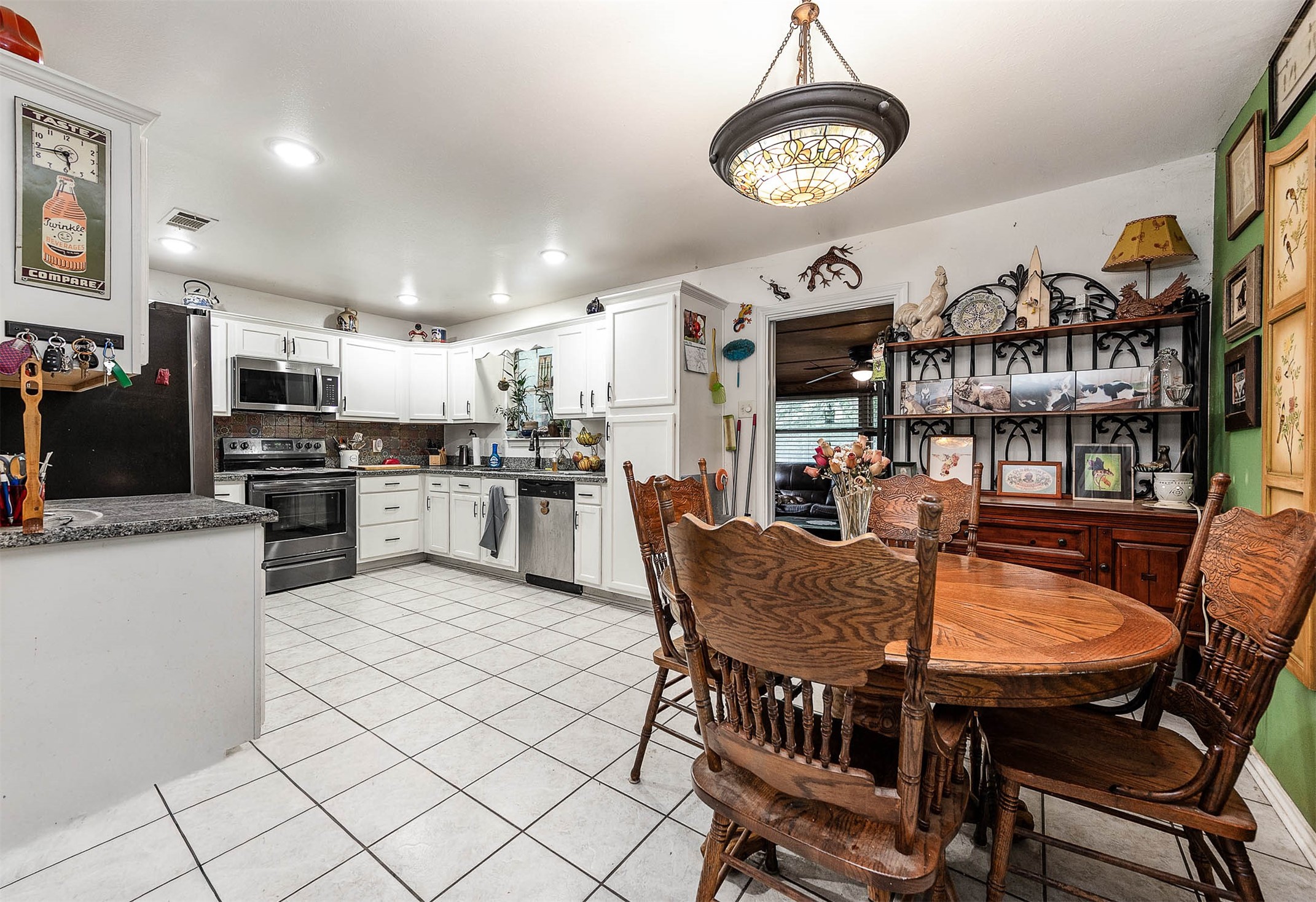 100 Magnolia Place Coldspring, TX 77331 - Photo 11 of 50 a view of a dining room with furniture