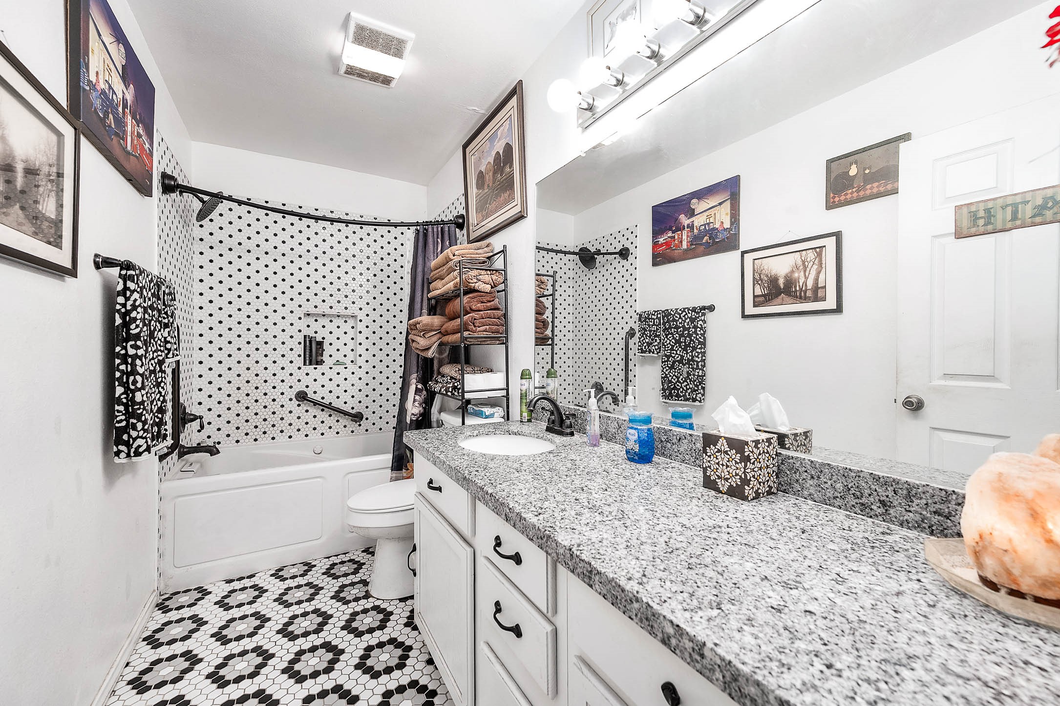 100 Magnolia Place Coldspring, TX 77331 - Photo 20 of 50 a bathroom with a sink a toilet and shower
