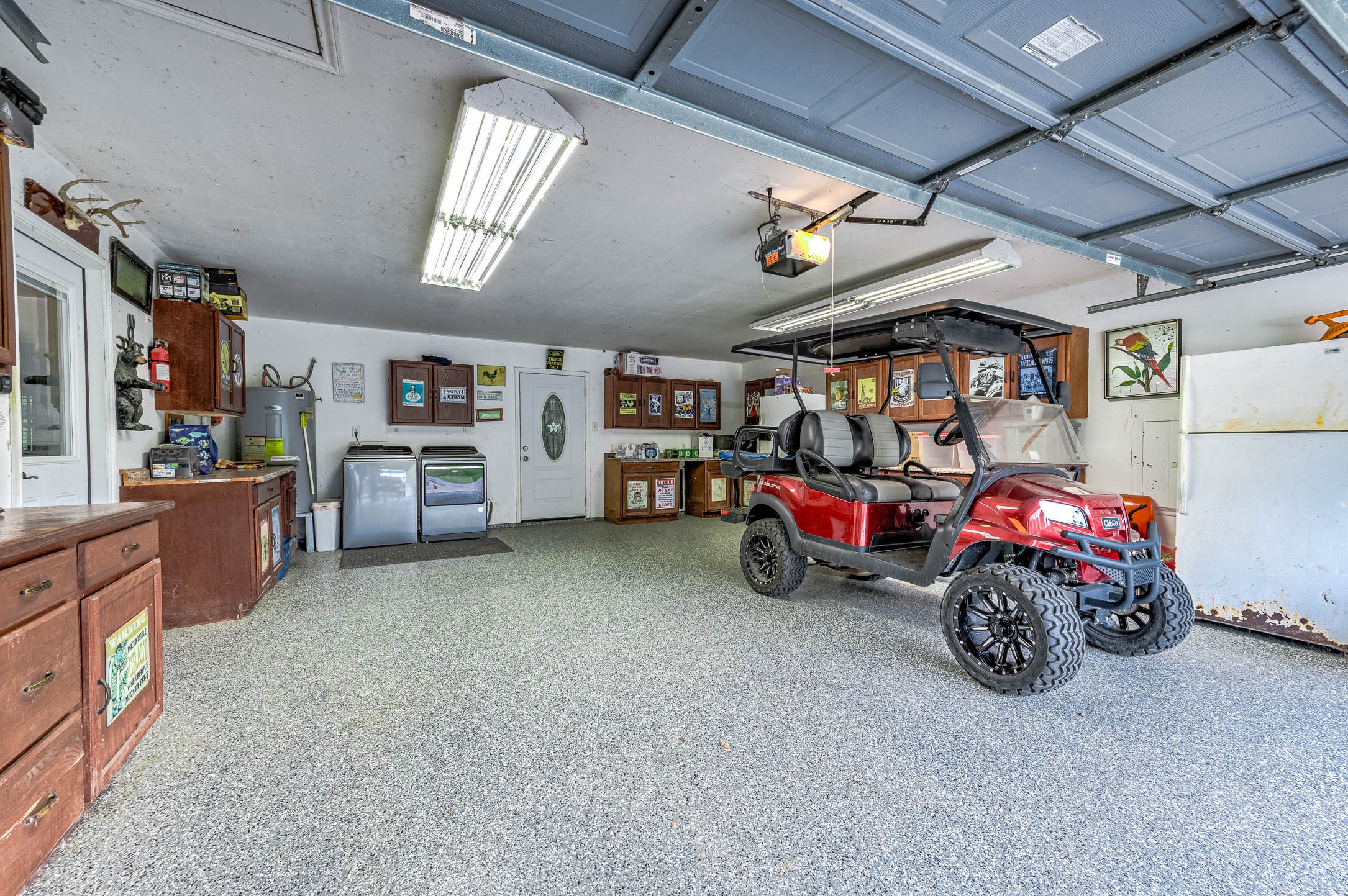 100 Magnolia Place Coldspring, TX 77331 - Photo 27 of 50 a car is parked in a garage