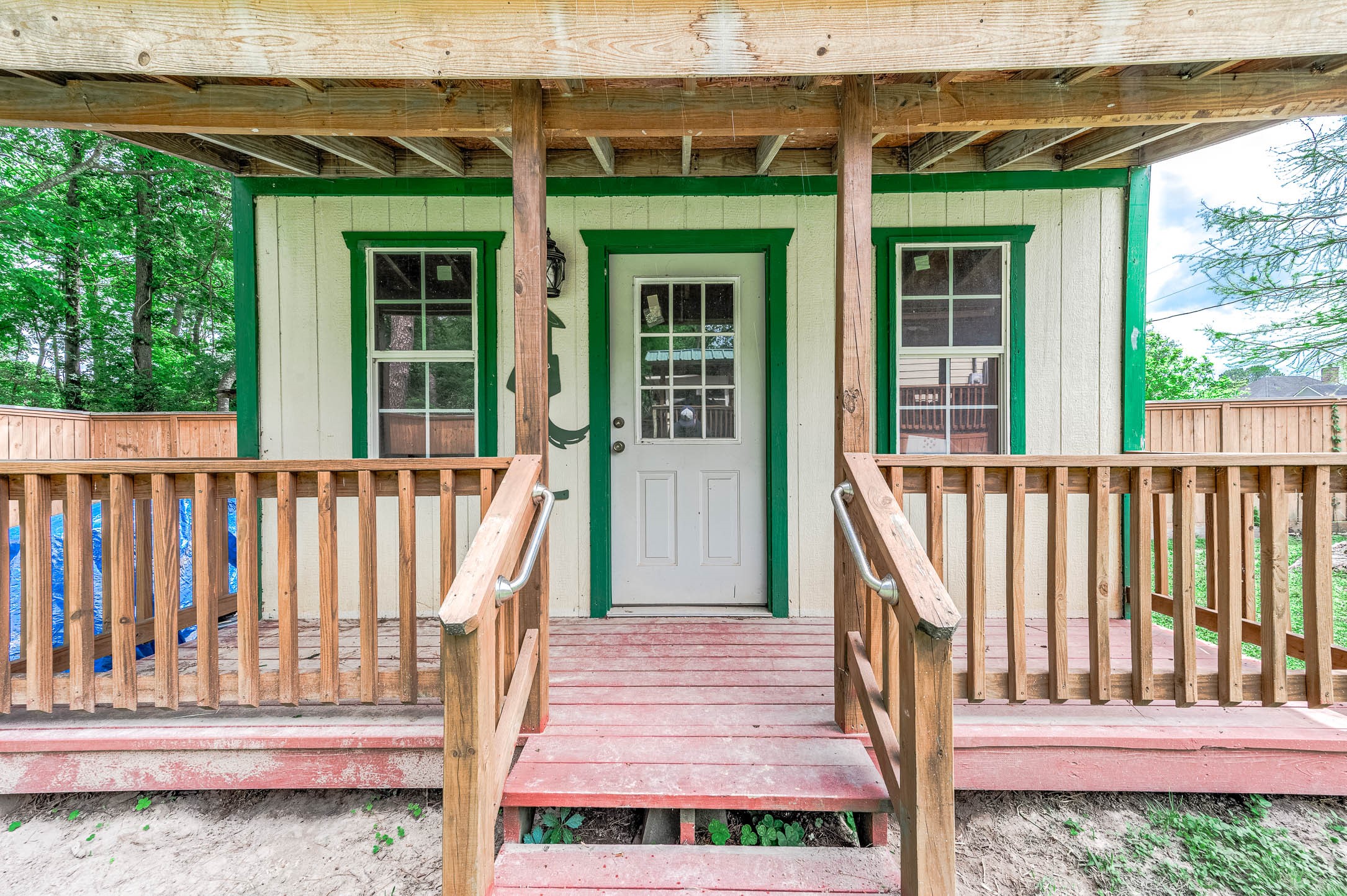 100 Magnolia Place Coldspring, TX 77331 - Photo 39 of 50 a view of a house with wooden fence