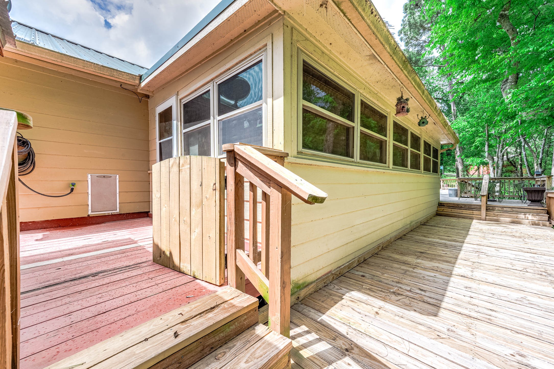 100 Magnolia Place Coldspring, TX 77331 - Photo 40 of 50 a view of a wooden deck