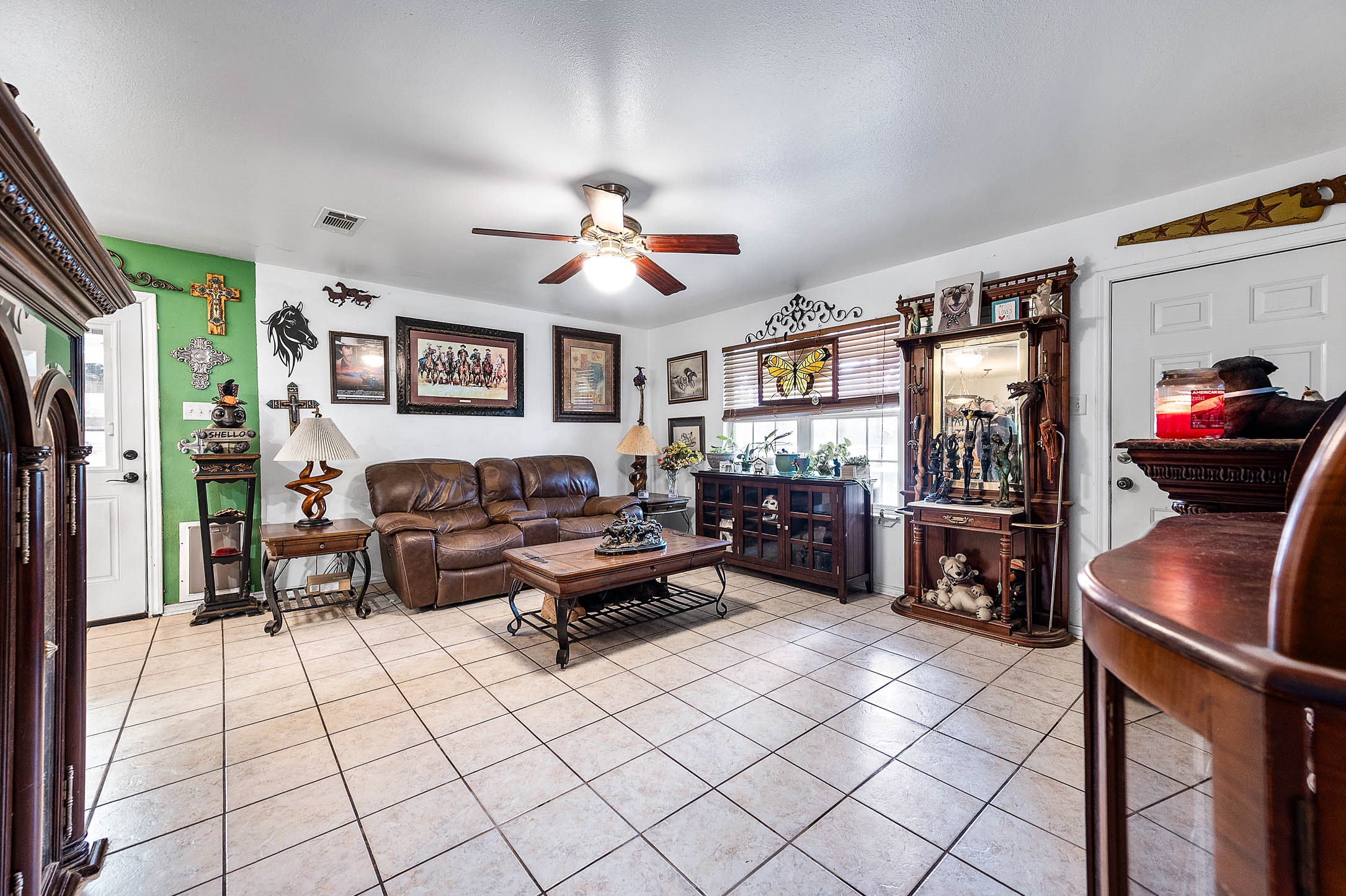 100 Magnolia Place Coldspring, TX 77331 - Photo 8 of 50 a living room with furniture and a flat screen tv