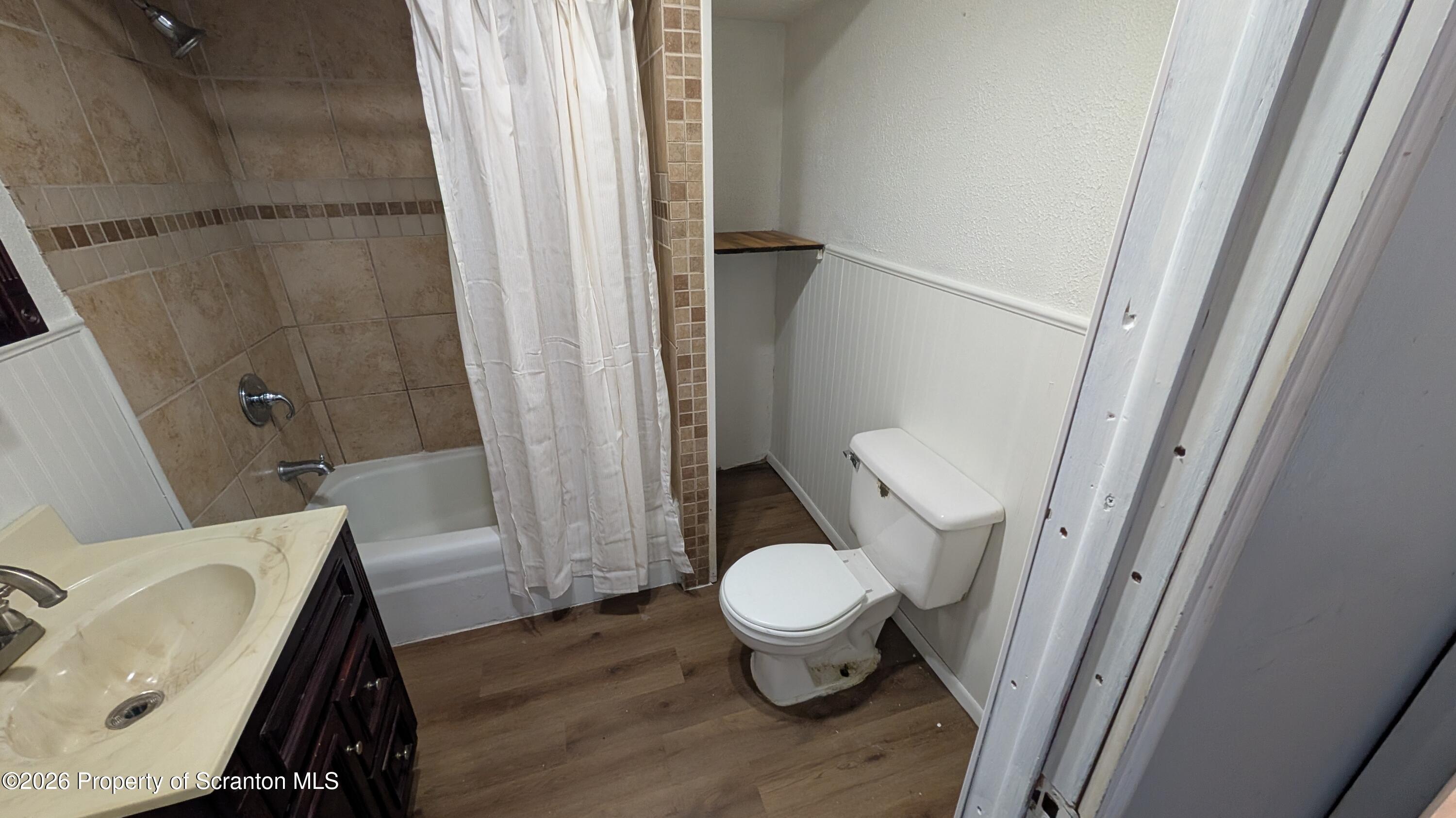 509 Main Street Duryea, PA 18642 - Photo 15 of 30 a bathroom with a sink and toilet