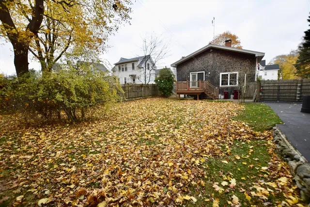 a front view of a house with yard