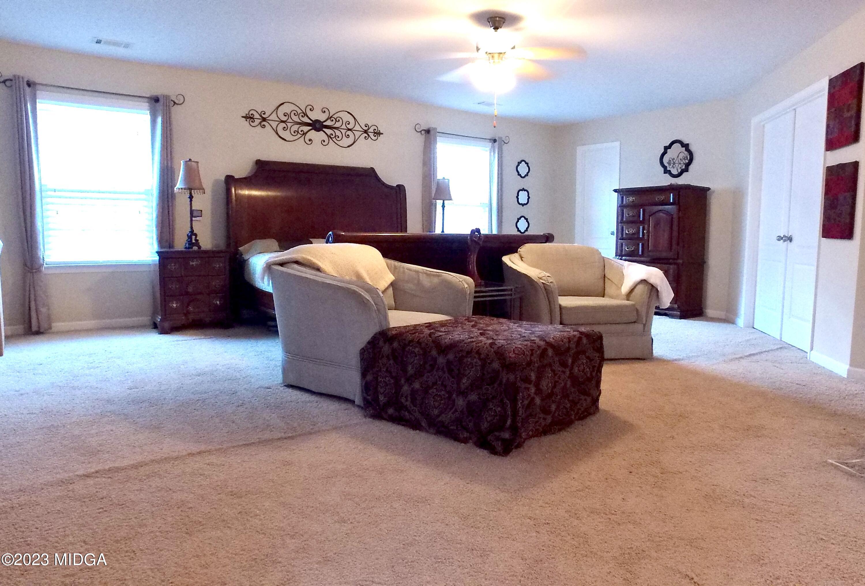 901 Broderick Circle Warner Robins, GA 31088 - Photo 12 of 19 a living room with furniture and a window