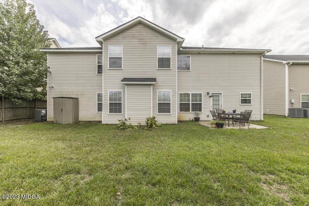 901 Broderick Circle Warner Robins, GA 31088 - Photo 19 of 19 a backyard of a house and outdoor seating