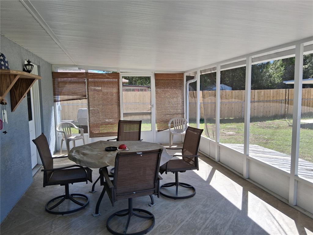 515 Boitnott Lane Bushnell, FL 33513 - Photo 3 of 13 a dining room with furniture window and outside view