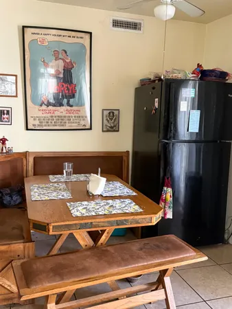 a view of a dining room with furniture