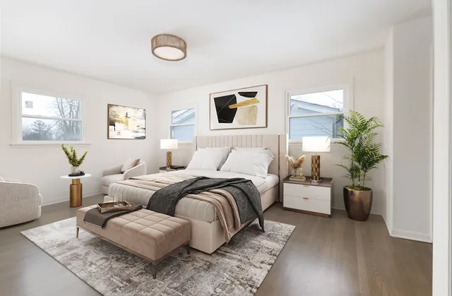 a bed room with a bed and a couch