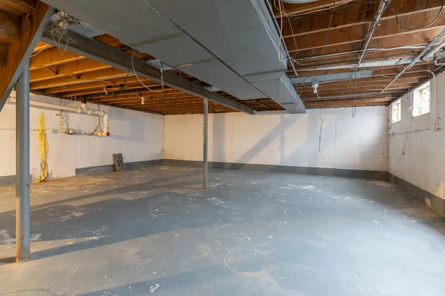 a view of a room with wooden walls