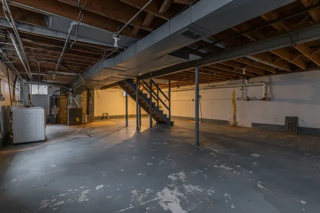 a view of a room with wooden walls