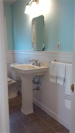 308 Dwight Road Springfield, MA 01108 - Photo 8 of 12 a bathroom with a sink and a mirror