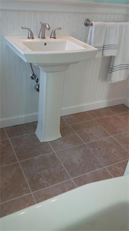 308 Dwight Road Springfield, MA 01108 - Photo 9 of 12 a bathroom with a sink and a mirror