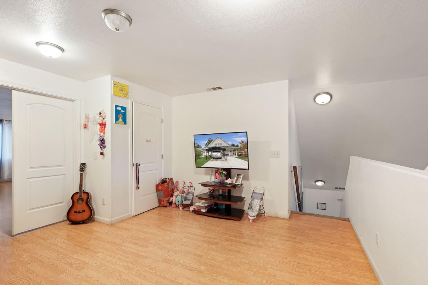 336 Locust Street Lodi, CA 95240 - Photo 14 of 31 a view of a room with toys and a large window