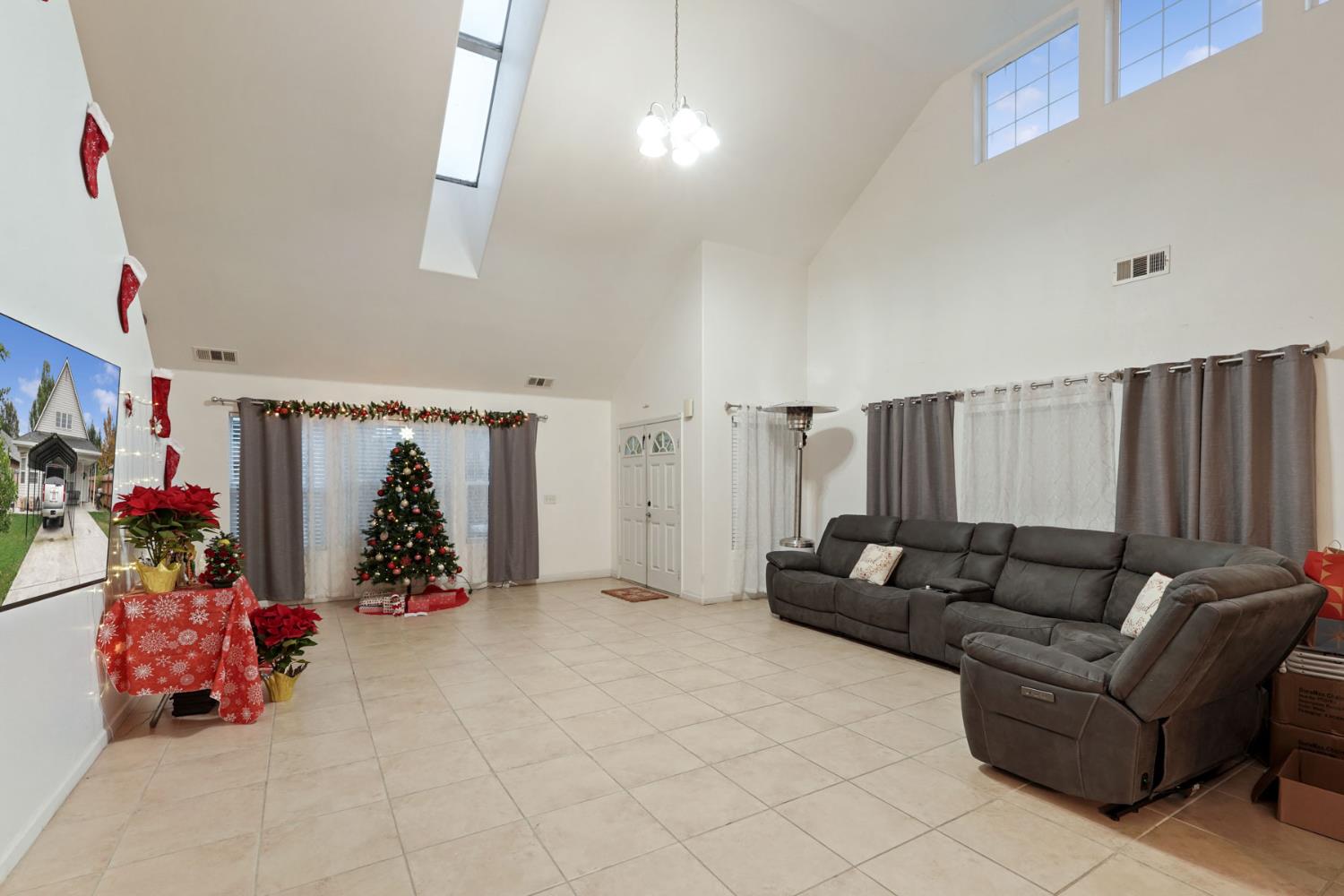 336 Locust Street Lodi, CA 95240 - Photo 15 of 31 a living room with furniture and toys
