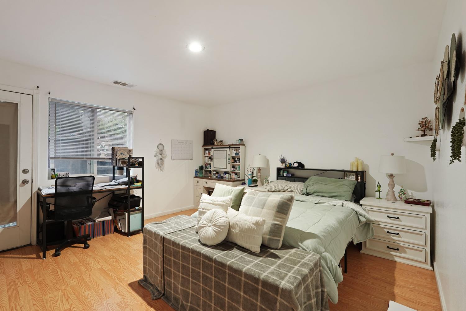 336 Locust Street Lodi, CA 95240 - Photo 22 of 31 a living room with furniture and a flat screen tv