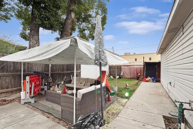 an outdoor space with patio lots of furniture and mountain view