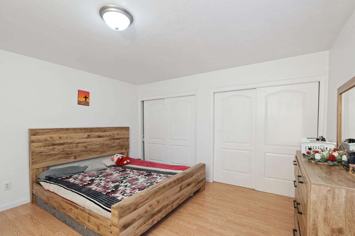 336 Locust Street Lodi, CA 95240 - Photo 7 of 31 a view of kitchen island with wooden floor