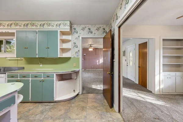 a view of a kitchen cabinets