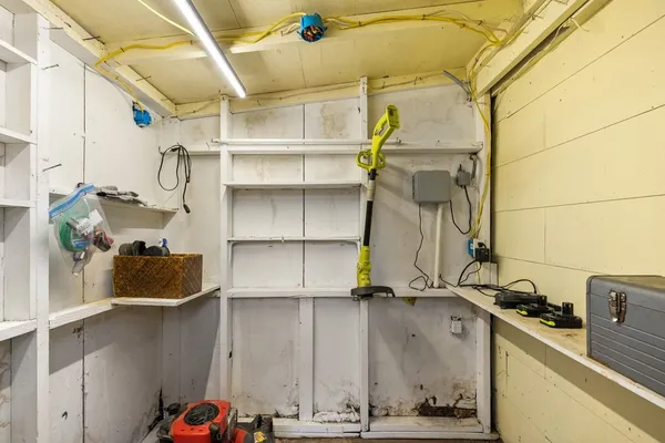 a room with storage and utility