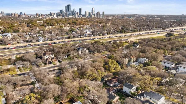 an aerial view of residential building and lake view