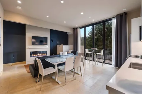 a sign that is sitting on a brick wall