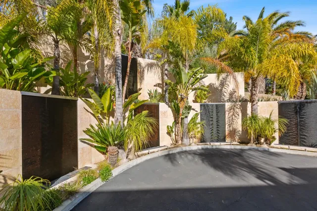 a view of swimming pool with a patio