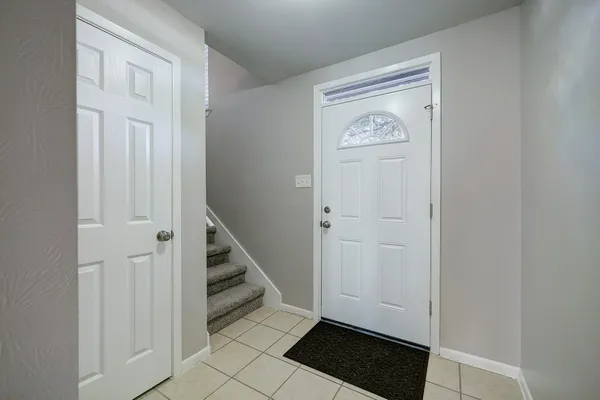 a view of entryway with wooden floor