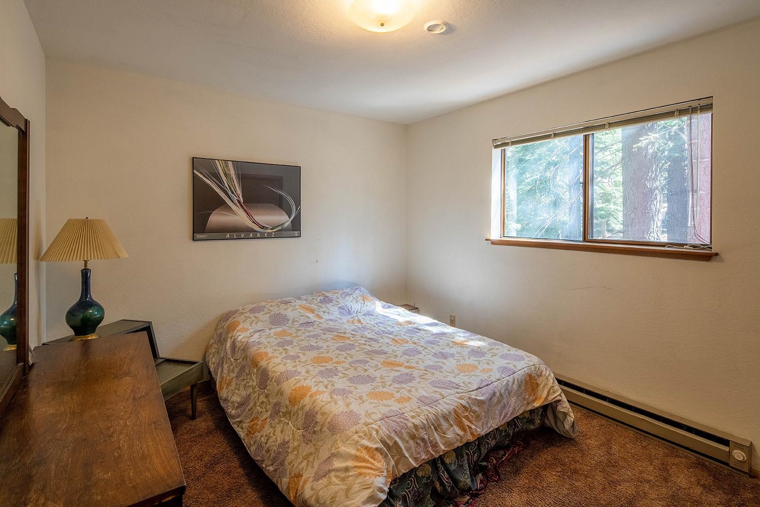 12119 Brookstone Drive Truckee, CA 96161 - Photo 15 of 21 a bedroom with a bed and a window