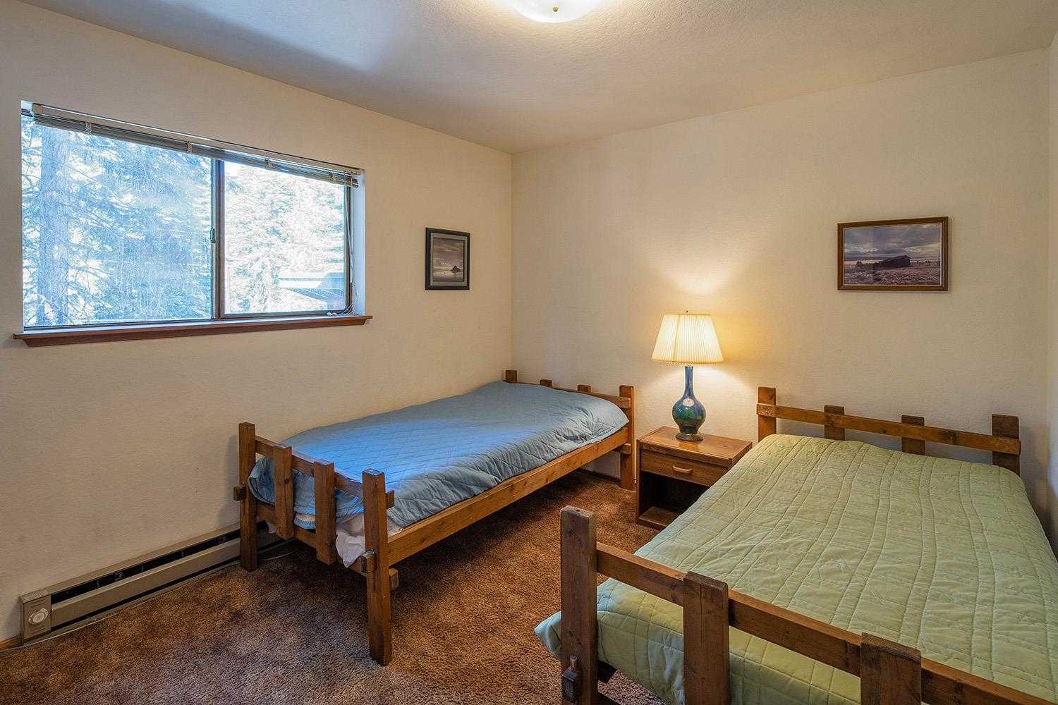 12119 Brookstone Drive Truckee, CA 96161 - Photo 16 of 21 a bedroom with two beds and window