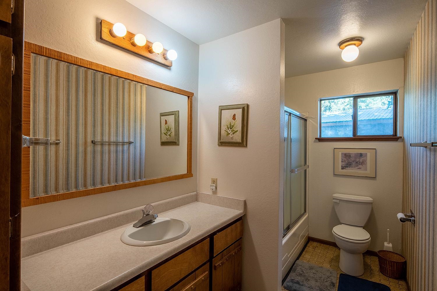 12119 Brookstone Drive Truckee, CA 96161 - Photo 17 of 21 a bathroom with a sink toilet and shower