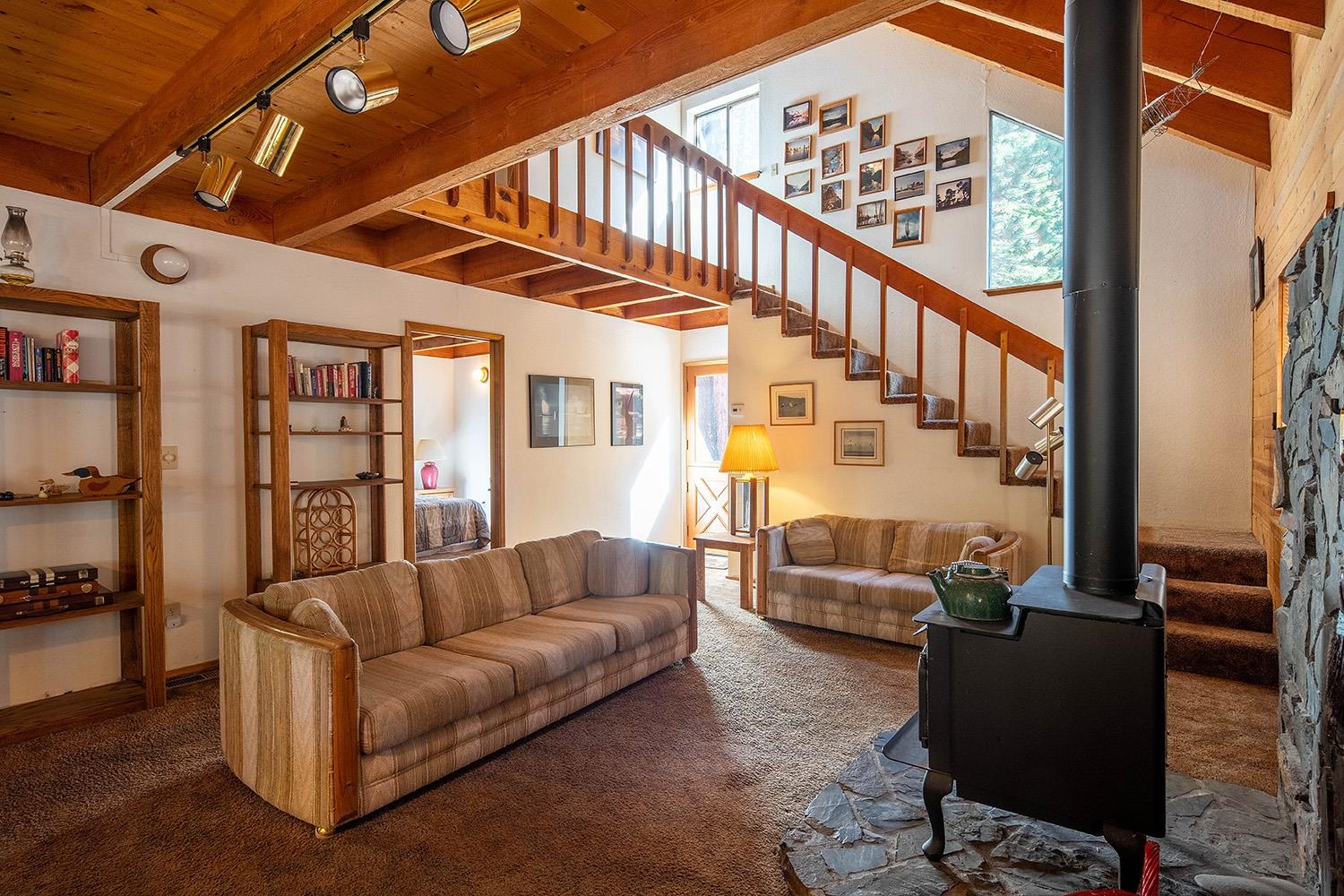 12119 Brookstone Drive Truckee, CA 96161 - Photo 6 of 21 a living room with furniture with wooden floor