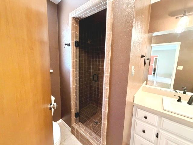 707 Rimrock Road Kerrville, TX 78028 - Photo 32 of 55 a bathroom with a double vanity sink and a mirror