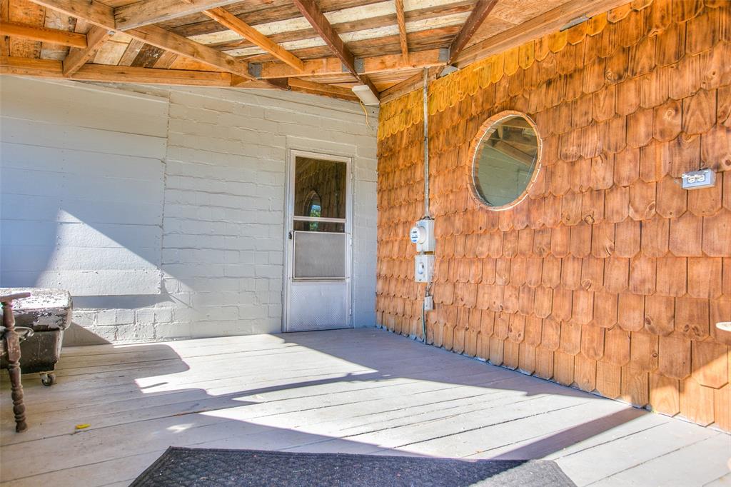 1303 North 7th Street Ballinger, TX 76821 - Photo 25 of 26 a view of entryway with wooden floor