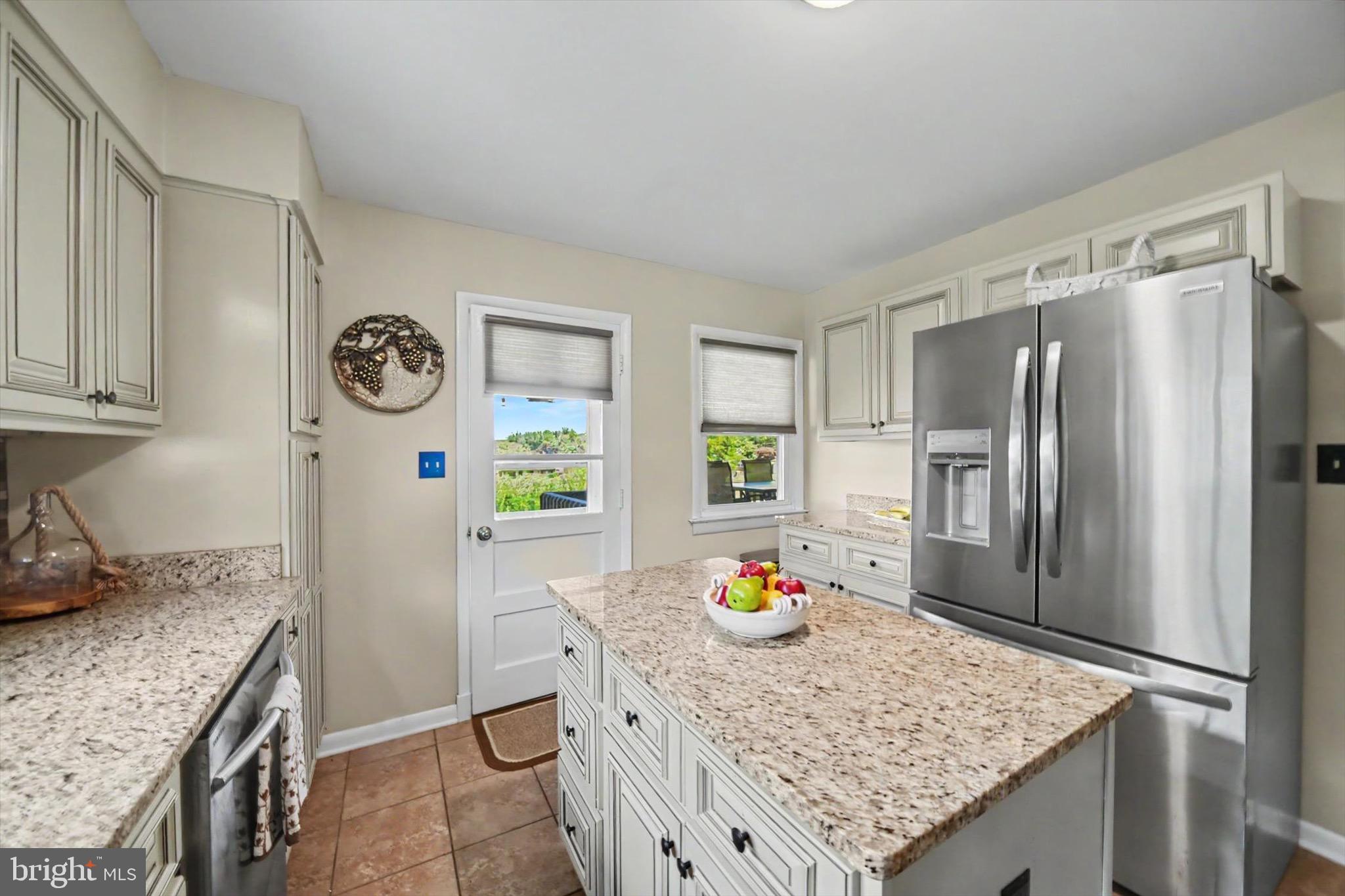 406 Plumtree Road Bel Air, MD 21015 - Photo 20 of 59 Large Center Island, Opens to Backyard Space
