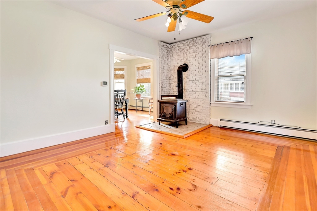 14 Tyler Street Methuen, MA 01844 - Photo 6 of 29 a view of a livingroom with a flat screen tv