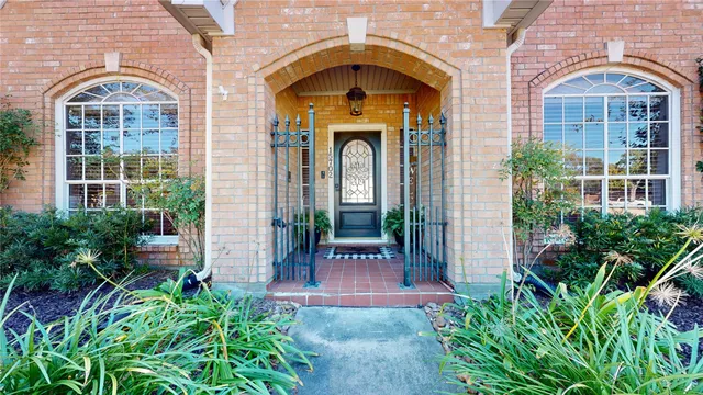 a front view of a house with a porch