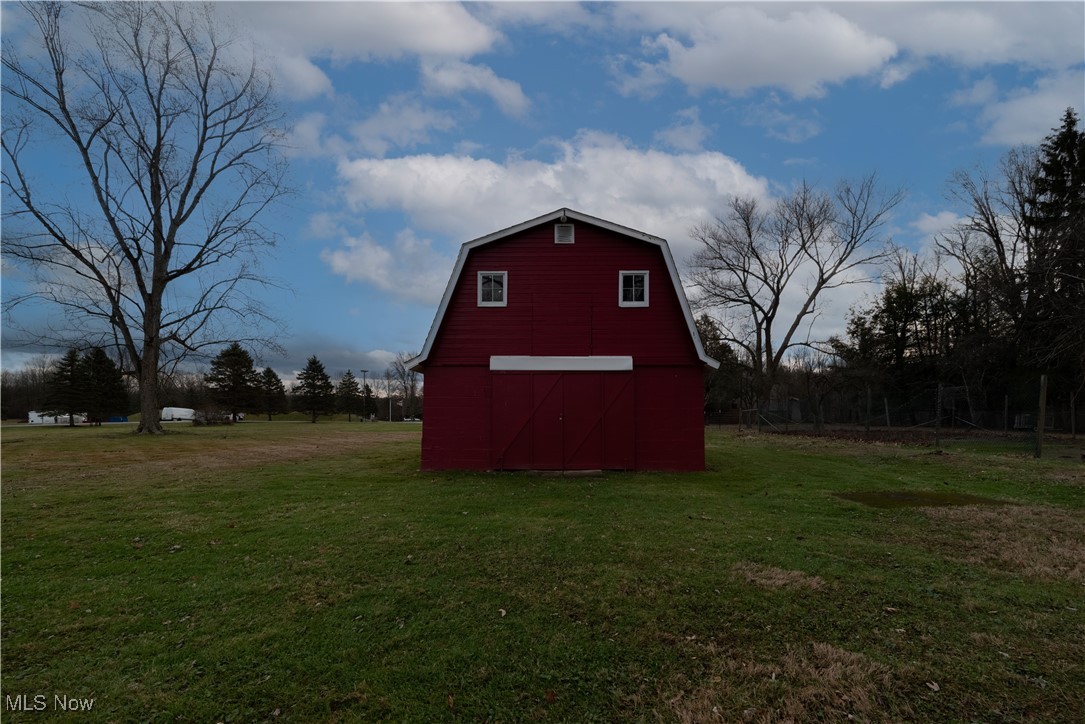 376 Johnson Plank Road Warren, OH 44481 - Photo 27 of 28 View of green lawn with a barn.