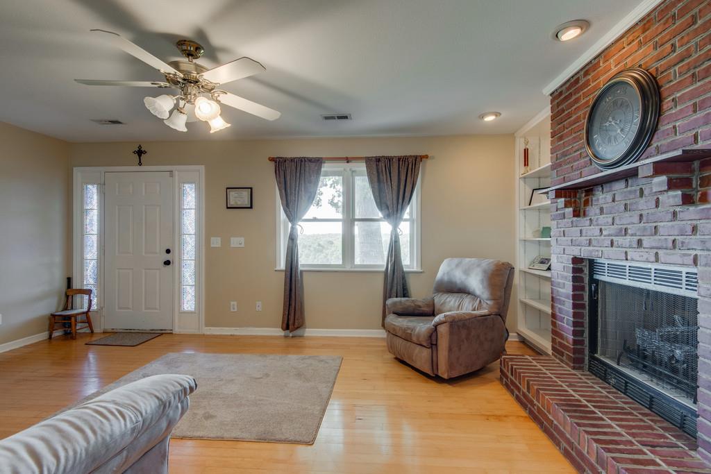 1043 Gallion Road Cumberland Furnace, TN 37051 - Photo 3 of 19 Fireplace with Wood Flooring in LR