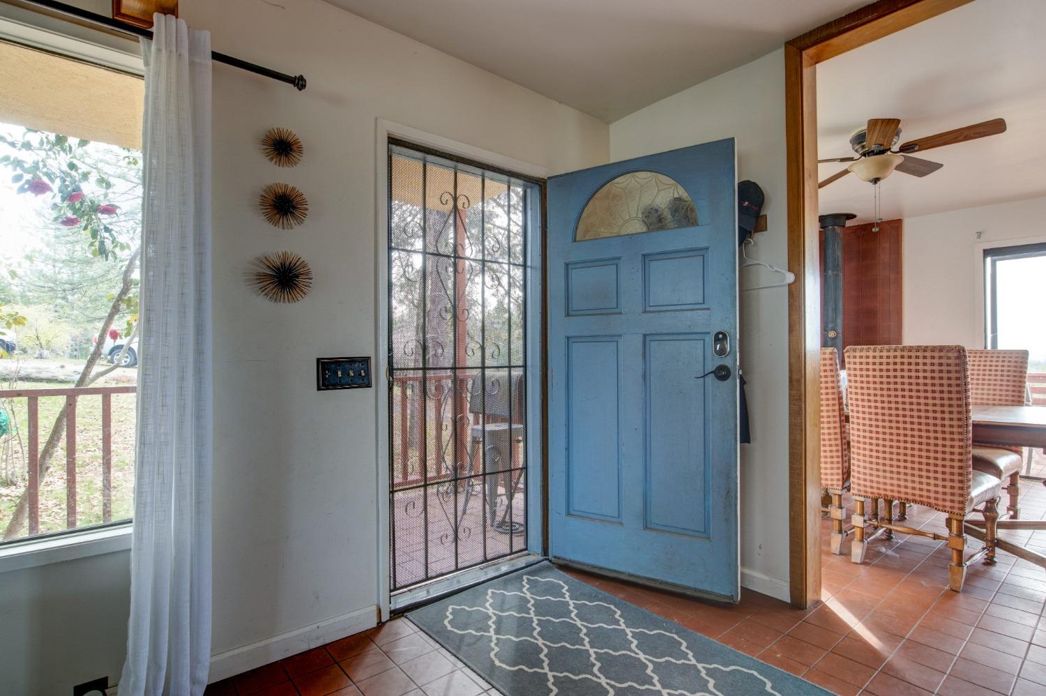 4771 Greenhills Road Placerville, CA 95667 - Photo 12 of 71 a view of an entryway with wooden floor and windows