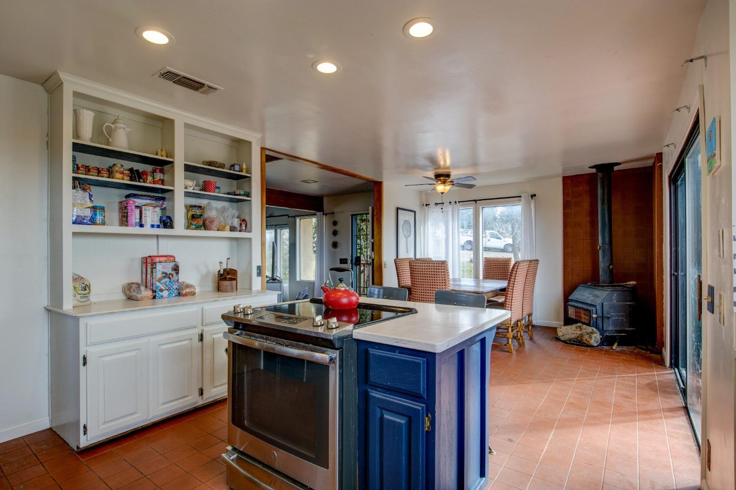 4771 Greenhills Road Placerville, CA 95667 - Photo 21 of 71 a kitchen that has a lot of cabinets in it