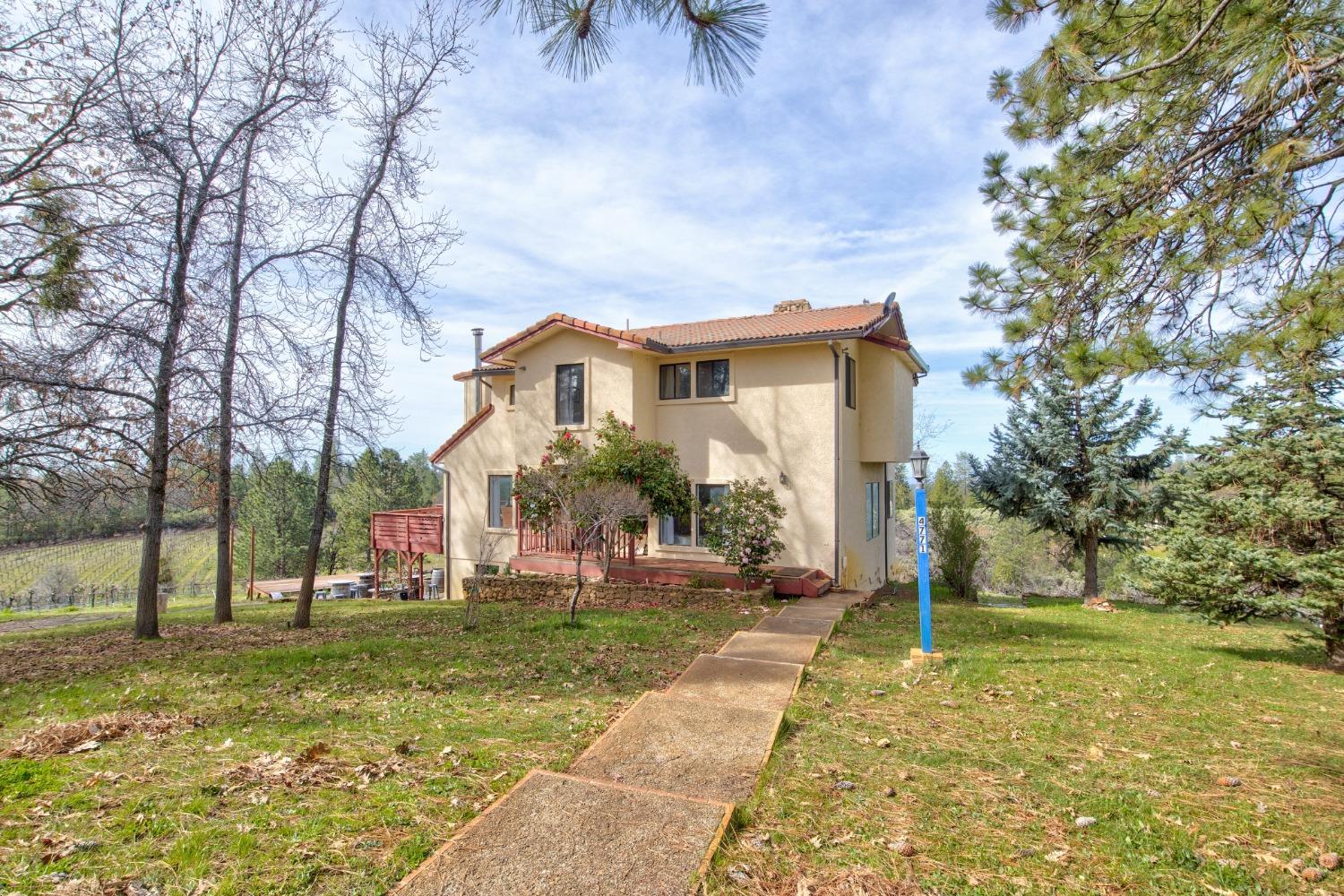 4771 Greenhills Road Placerville, CA 95667 - Photo 29 of 71 a view of a house with a yard