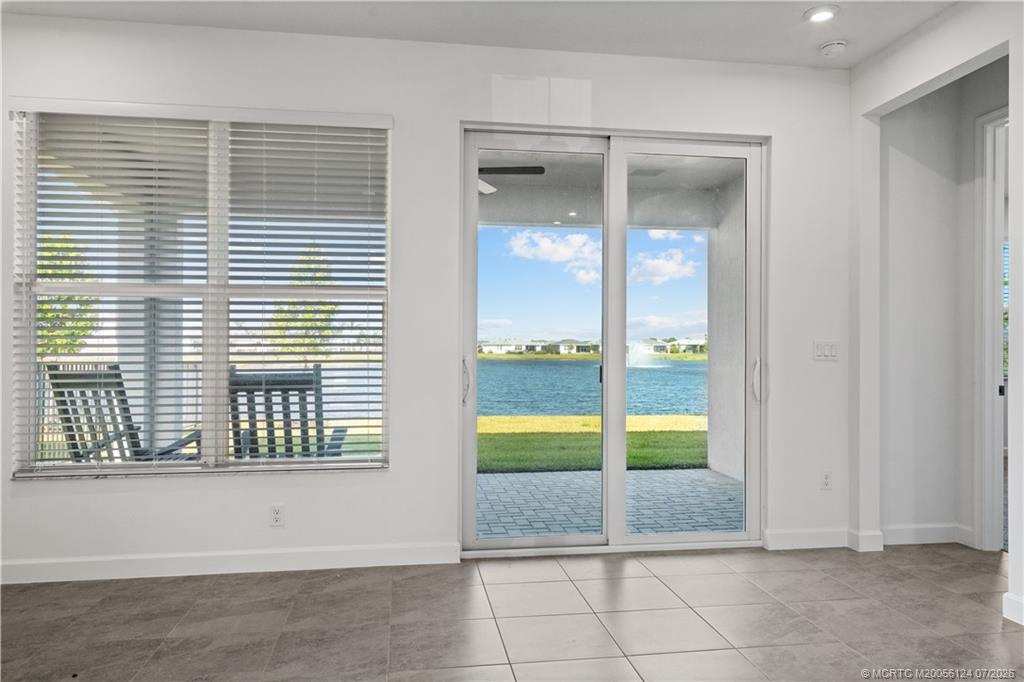 9731 Southwest Indra Way Port St. Lucie, FL 34987 - Photo 14 of 33 Living Room and Lovely Water View